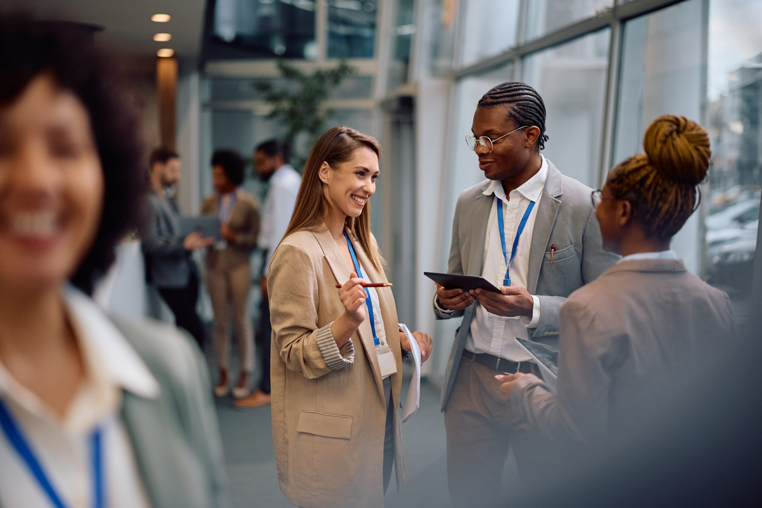 People having a conversation at a conference